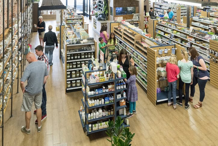 Groups of customers look at products in a store